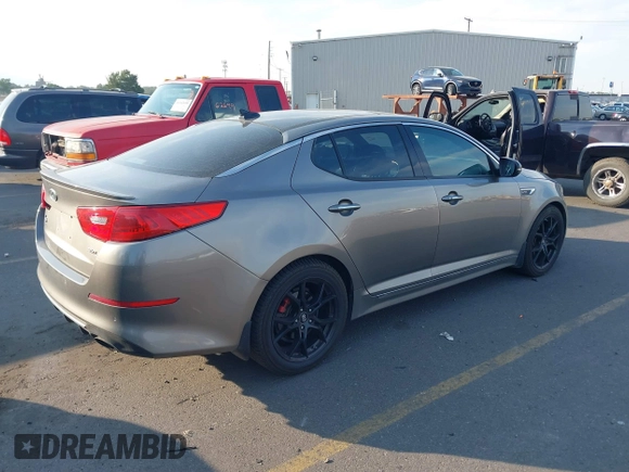 2015 Kia Optima SX Turbo with VIN 5XXGR4A61FG395148, listed as a IAAI auction lot 40313811 with 104,978 mi miles and . Bid and sale history available at DreamBid. Image 4.