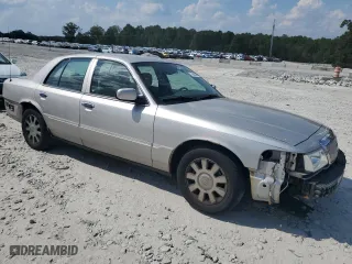 2005 Mercury Grand Marquis LS Premium with VIN 2MEHM75W75X657043, listed as a Copart auction lot 71648694 with 143,672 mi miles and Salvage Title. Bid and sale history available at carsss.com. Image 4.