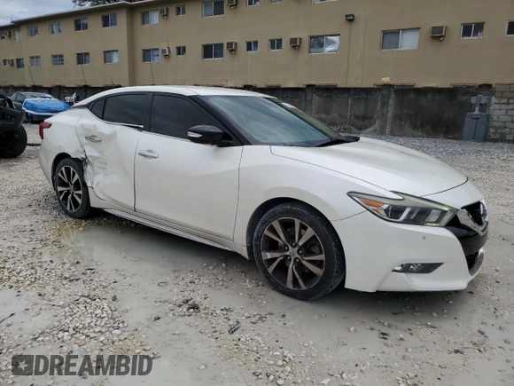 2017 Nissan Maxima SV with VIN 1N4AA6APXHC446995, listed as a Copart auction lot 51633115 with 56,949 mi miles and Salvage Title. Bid and sale history available at DreamBid. Image 4.