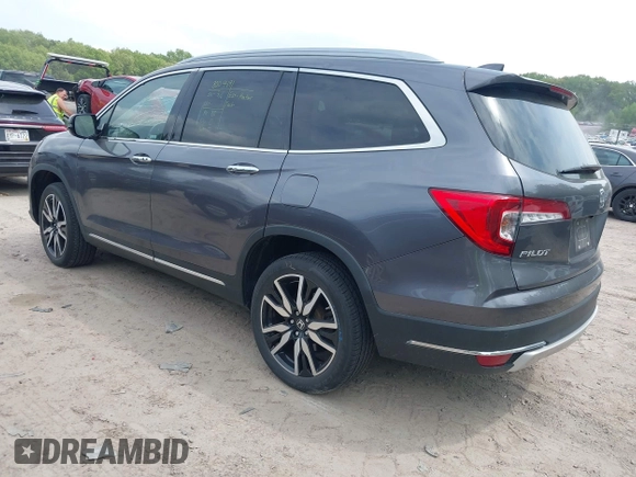 2020 Honda Pilot Elite with VIN 5FNYF6H00LB027472, listed as a IAAI auction lot 42253478 with 69,988 mi miles and . Bid and sale history available at DreamBid. Image 3.
