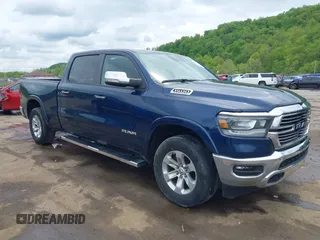 2022 Ram 1500 Laramie with VIN 1C6SRFRTXNN223050, listed as a IAAI auction lot 42173258 with 59,637 mi miles and . Bid and sale history available at DreamBid. Image 1.