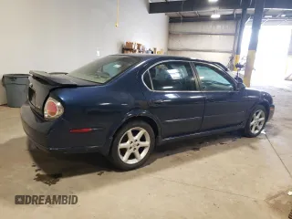 2002 Nissan Maxima GXE z VIN JN1DA31D82T429859, wystawiony jako Copart lot #67025674 z przebiegiem 153 180 mil mil oraz Szkoda całkowita • Salvage title. Historia ofert i sprzedaży dostępna na DreamBid. Obrazek 3.
