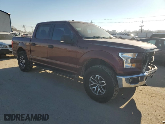 2015 Ford F-150 XLT with VIN 1FTEW1E81FKD22779, listed as a Copart auction lot 42975895 with 144,062 mi miles and Salvage Title. Bid and sale history available at carsss.com. Image 4.