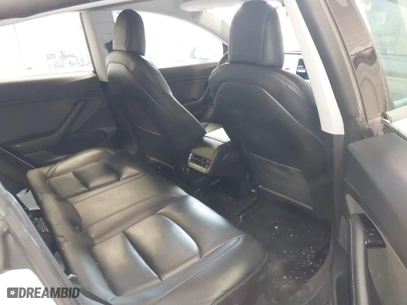 2020 Tesla Model 3 Standard Range Plus with VIN 5YJ3E1EA4LF802207, listed as a IAAI auction lot 41843515 with 67,156 mi miles. Bid and sale history available at carsss.com. Image 8.