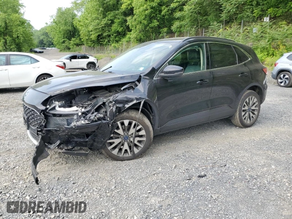 2020 Ford Escape Titanium с VIN 1FMCU9J97LUA20595, выставлен на аукционе Copart как лот 59476745 с пробегом 74 518 миль миль и Списание • Salvage title. История ставок и продаж доступна на DreamBid. Изображение 1.