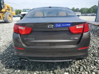 2014 Kia Optima EX z VIN 5XXGN4A76EG337099, wystawiony jako Copart lot #54508445 z przebiegiem 317 116 mil mil oraz Czysty tytuł • Clean title. Historia ofert i sprzedaży dostępna na DreamBid. Obrazek 6.