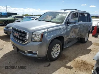 2020 GMC Yukon SLE with VIN 1GKS2AKC5LR120705, listed as a Copart auction lot 72464444 with 69,799 mi miles and Salvage Title. Bid and sale history available at carsss.com. Image 1.