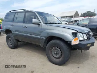2001 Lexus LX 470 z VIN JTJHT00WX13509489, wystawiony jako IAAI lot #42227083 z przebiegiem 360 283 mil mil oraz . Historia ofert i sprzedaży dostępna na DreamBid. Obrazek 1.