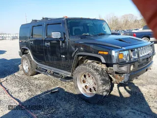 2003 Hummer H2 with VIN 5GRGN23U43H102108, listed as a IAAI auction lot 41679329 with 210,556 mi miles. Bid and sale history available at carsss.com. Image 1.