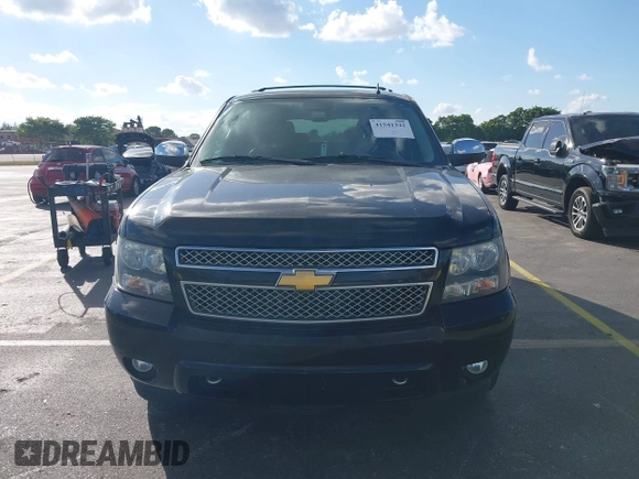 2012 Chevrolet Tahoe LTZ with VIN 1GNSKCE04CR218348, listed as a IAAI auction lot 41541342 with 96,365 mi miles and . Bid and sale history available at DreamBid. Image 12.