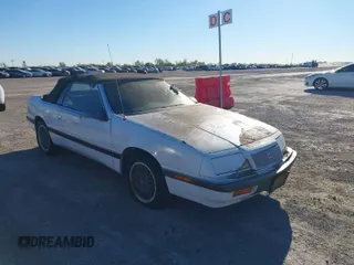 1989 Chrysler LeBaron with VIN 1C3XJ45A1KG217320, listed as a IAAI auction lot 40849525 with 51,279 mi miles and . Bid and sale history available at DreamBid. Image 1.