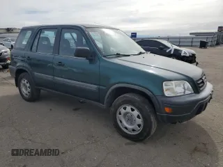 1999 Honda CR-V LX with VIN JHLRD2844XC010900, listed as a Copart auction lot 44024355 with 114,011 mi miles and Salvage Title. Bid and sale history available at carsss.com. Image 4.