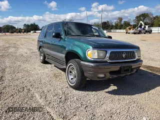 2000 Mercury Mountaineer z VIN 4M2ZU66P1YUJ05468, wystawiony jako Copart lot #75682513 z przebiegiem 211 748 mil mil oraz Szkoda całkowita • Salvage title. Historia ofert i sprzedaży dostępna na DreamBid. Obrazek 11.