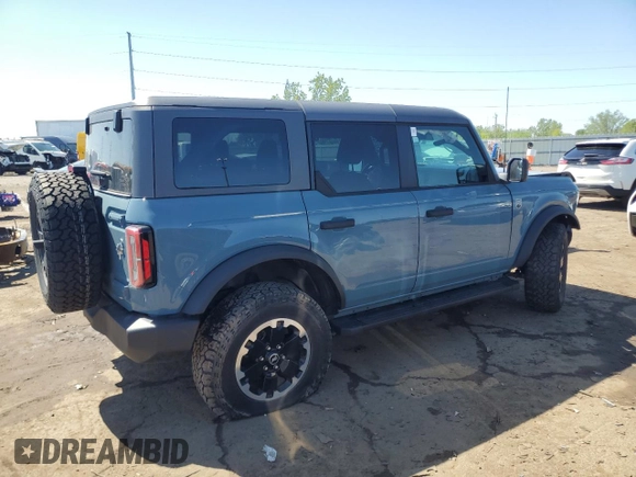 2022 Ford Bronco with VIN 1FMDE5BH3NLA92077, listed as a Copart auction lot 54380065 with 69,360 mi miles and Clean title. Bid and sale history available at DreamBid. Image 3.