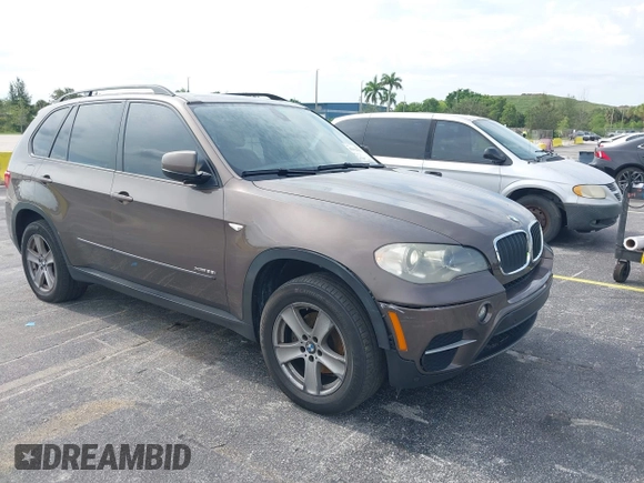 2012 BMW X5 35i z VIN 5UXZV4C53CL991140, wystawiony jako IAAI lot #42312591 z przebiegiem 115 875 mil mil oraz . Historia ofert i sprzedaży dostępna na DreamBid. Obrazek 1.