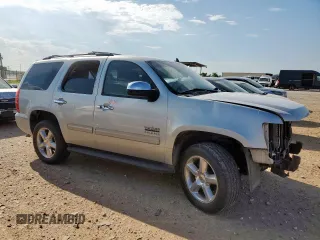 2011 Chevrolet Tahoe LS with VIN 1GNSCAE02BR169442, listed as a Copart auction lot 63054955 with 208,292 mi miles and Salvage title. Bid and sale history available at DreamBid. Image 4.
