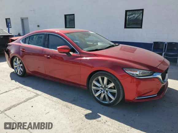 2021 Mazda 6 Carbon Edition with VIN JM1GL1WY8M1605828, listed as a Copart auction lot 48435225 with 70,917 mi miles and Salvage Title. Bid and sale history available at DreamBid. Image 4.