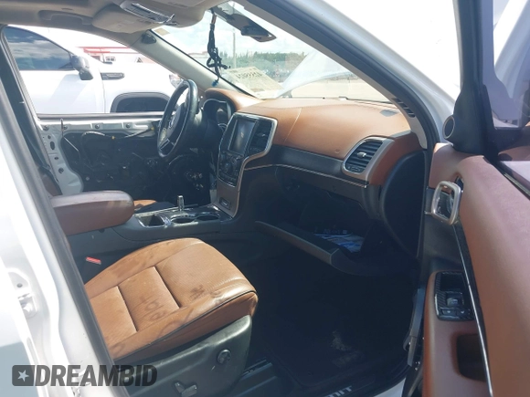 2015 Jeep Grand Cherokee Summit with VIN 1C4RJEJG5FC105038, listed as a IAAI auction lot 42555024 with 133,077 mi miles and . Bid and sale history available at DreamBid. Image 5.