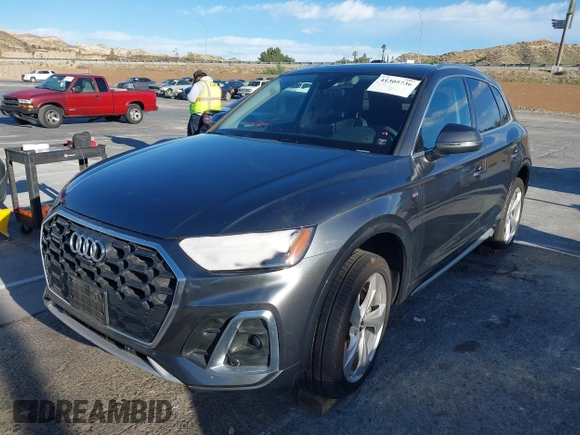 2023 Audi Q5 S line Premium Plus z VIN WA1EAAFY7P2065409, wystawiony jako IAAI lot #41305736 z przebiegiem 15 251 mil mil oraz . Historia ofert i sprzedaży dostępna na DreamBid. Obrazek 2.