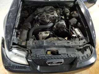 1999 Ford Mustang z VIN 1FAFP4048XF234576, wystawiony jako Copart lot #41871305 z przebiegiem 164 301 mil mil oraz Szkoda całkowita • Salvage title. Historia ofert i sprzedaży dostępna na DreamBid. Obrazek 12.