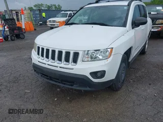 2011 Jeep Compass Latitude with VIN 1J4NT1FB1BD192076, listed as a IAAI auction lot 42121930 with 148,548 mi miles. Bid and sale history available at carsss.com. Image 6.
