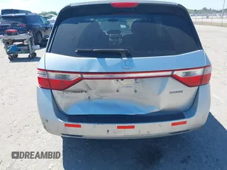2012 Honda Odyssey Touring with VIN 5FNRL5H90CB099519, listed as a IAAI auction lot 41854550 with 185,110 mi miles. Bid and sale history available at carsss.com. Image 6.