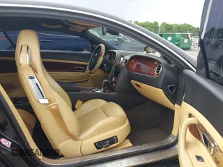 2005 Bentley Continental GT GT z VIN SCBCR63W55C025099, wystawiony jako IAAI lot #42208951 z przebiegiem 123 712 mil mil oraz . Historia ofert i sprzedaży dostępna na DreamBid. Obrazek 5.