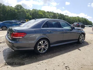 2014 Mercedes-Benz E 350 Sport with VIN WDDHF5KB7EB038257, listed as a Copart auction lot 61251595 with 110,814 mi miles and Salvage title. Bid and sale history available at DreamBid. Image 3.