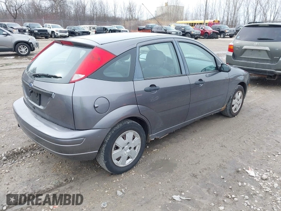 2007 Ford Focus S with VIN 1FAFP37N67W221172, listed as a IAAI auction lot 41948604 with 149,564 mi miles and . Bid and sale history available at carsss.com. Image 4.