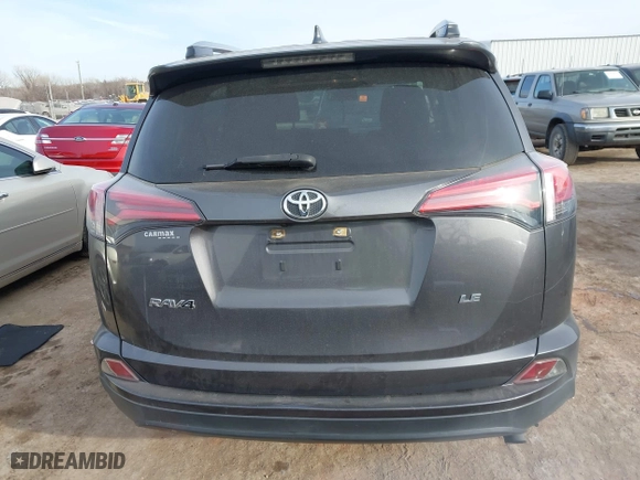 2018 Toyota RAV4 LE with VIN JTMZFREV4JJ183106, listed as a IAAI auction lot 41449468 with 114,719 mi miles. Bid and sale history available at carsss.com. Image 16.