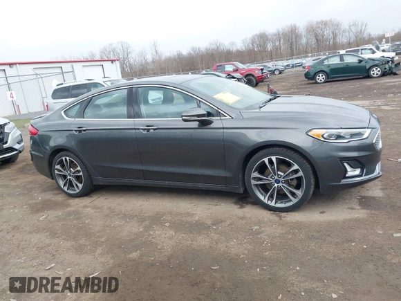 2019 Ford Fusion Titanium with VIN 3FA6P0K9XKR259556, listed as a IAAI auction lot 41823997 with 132,071 mi miles. Bid and sale history available at carsss.com. Image 13.
