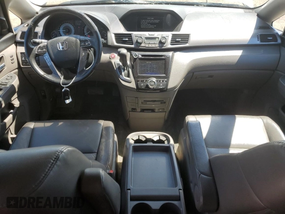 2015 Honda Odyssey Touring Elite with VIN 5FNRL5H92FB504977, listed as a Copart auction lot 56657195 with 189,438 mi miles and Salvage title. Bid and sale history available at DreamBid. Image 8.