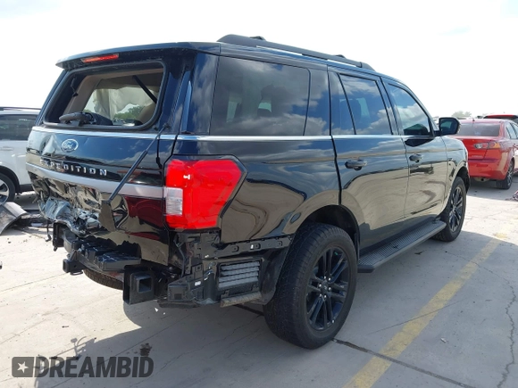 2024 Ford Expedition XLT with VIN 1FMJU1H88REA29329, listed as a IAAI auction lot 41982656 with 8,721 mi miles and . Bid and sale history available at DreamBid. Image 4.