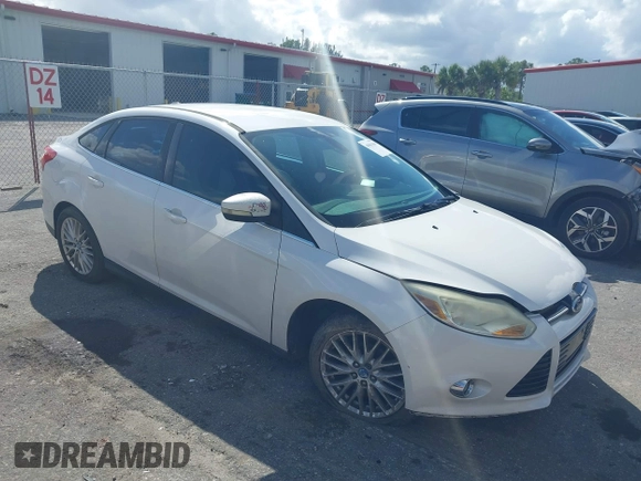 2012 Ford Focus SEL with VIN 1FAHP3H25CL282490, listed as a IAAI auction lot 40563360 with 223,864 mi miles. Bid and sale history available at carsss.com. Image 1.