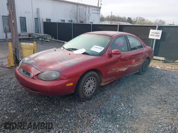 1998 Mercury Sable GS with VIN 1MEFM50U9WA605604, listed as a IAAI auction lot 41809408 with 142,175 mi miles and . Bid and sale history available at DreamBid. Image 2.