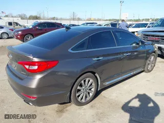 2016 Hyundai Sonata 2.4L Sport with VIN 5NPE34AF8GH407309, listed as a IAAI auction lot 41711709 with 127,460 mi miles. Bid and sale history available at carsss.com. Image 4.