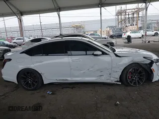2021 Cadillac CT5 Sport z VIN 1G6DU5RK9M0117981, wystawiony jako IAAI lot #42021432 z przebiegiem 67 363 mil mil oraz . Historia ofert i sprzedaży dostępna na DreamBid. Obrazek 13.