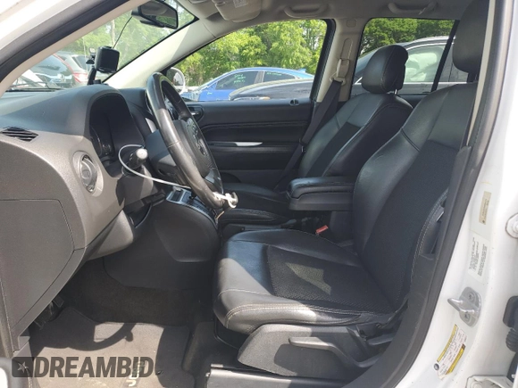2014 Jeep Compass Latitude with VIN 1C4NJCEB4ED894471, listed as a Copart auction lot 54052915 with 171,843 mi miles and Clean Title. Bid and sale history available at carsss.com. Image 7.