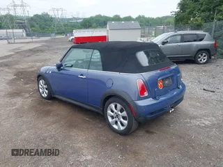 2006 MINI Convertible S z VIN WMWRH33516TL93102, wystawiony jako IAAI lot #42529434 z przebiegiem 123 292 mil mil oraz . Historia ofert i sprzedaży dostępna na DreamBid. Obrazek 3.