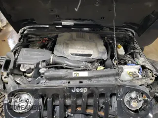 2015 Jeep Wrangler Unlimited Rubicon Hard Rock with VIN 1C4HJWFG4FL676868, listed as a Copart auction lot 48489525 with 100,771 mi miles and Salvage title. Bid and sale history available at DreamBid. Image 11.