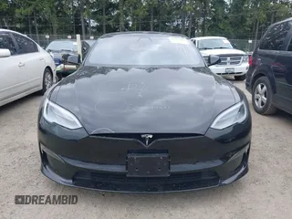 2021 Tesla Model S Plaid with VIN 5YJSA1E62MF447509, listed as a IAAI auction lot 42509281 with 32,372 mi miles and . Bid and sale history available at DreamBid. Image 13.