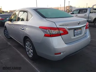 2014 Nissan Sentra SR with VIN 3N1AB7AP6EL684309, listed as a IAAI auction lot 41933659 with 74,830 mi miles. Bid and sale history available at carsss.com. Image 3.