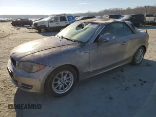 2011 BMW 1 Series 128i with VIN WBAUL7C52BVM79341, listed as a Copart auction lot 86450144 with 131,955 mi miles and Salvage Title. Bid and sale history available at carsss.com. Image 1.