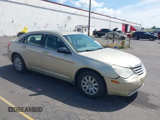 2010 Chrysler Sebring Touring z VIN 1C3CC4FBXAN144734, wystawiony jako IAAI lot #42548485 z przebiegiem 160 588 mil mil oraz . Historia ofert i sprzedaży dostępna na DreamBid. Obrazek 1.