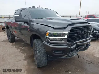 2024 Ram 2500 Laramie with VIN 3C6UR5FL1RG142556, listed as a IAAI auction lot 41428812 with 42,004 mi miles. Bid and sale history available at carsss.com. Image 1.