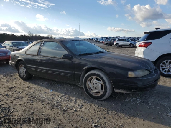 1996 Ford Thunderbird LX z VIN 1FALP62W1TH162826, wystawiony jako Copart lot #87037034 z przebiegiem 181 379 mil mil oraz Czysty tytuł • Clean title. Historia ofert i sprzedaży dostępna na DreamBid. Obrazek 4.