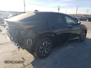 2023 Lexus RZ 450e Premium z VIN JTJAAAAB9PA007621, wystawiony jako Copart lot #80594143 z przebiegiem 7673 mil mil oraz Szkody całkowita. Historia ofert i sprzedaży dostępna na DreamBid. Obrazek 3.