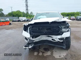 2020 Ram 1500 Big Horn with VIN 1C6SRFFT0LN105011, listed as a IAAI auction lot 42512812 with 71,825 mi miles and . Bid and sale history available at DreamBid. Image 12.