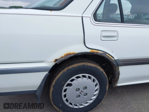 1988 Honda Accord z VIN 1HGCA5636JA003992, wystawiony jako IAAI lot #42474683 z przebiegiem 184 868 mil mil oraz . Historia ofert i sprzedaży dostępna na DreamBid. Obrazek 6.