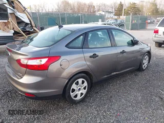 2013 Ford Focus S with VIN 1FADP3E20DL156901, listed as a IAAI auction lot 41784334 with 190,821 mi miles. Bid and sale history available at carsss.com. Image 4.
